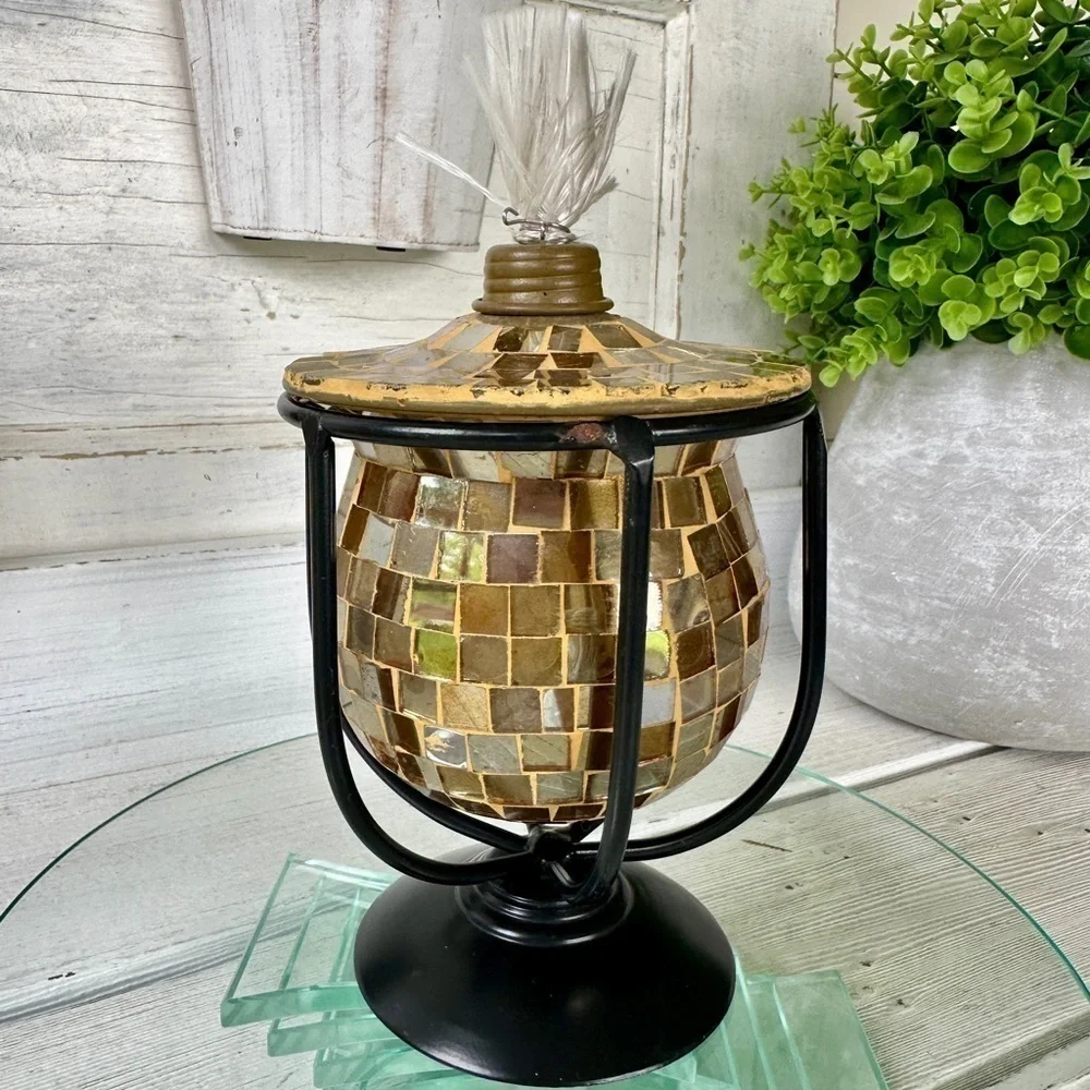 GOLD MOSAIC LANTERN, NWOT, CRADLED IN A BLACK METAL BASE. SCREW-ON TOP.